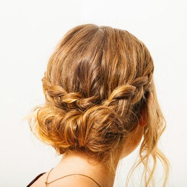 Garnier Fructis Curl Construct Mousse - Curly Updo Hairstyle Gallery - Learn how to style Twisted Curly Ponytail - romantic, easy curly look